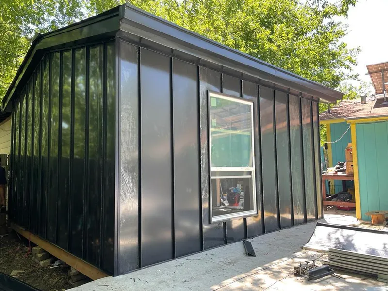 Black standing seam metal wall panels for Metal Roof Installation in Fruit Cove